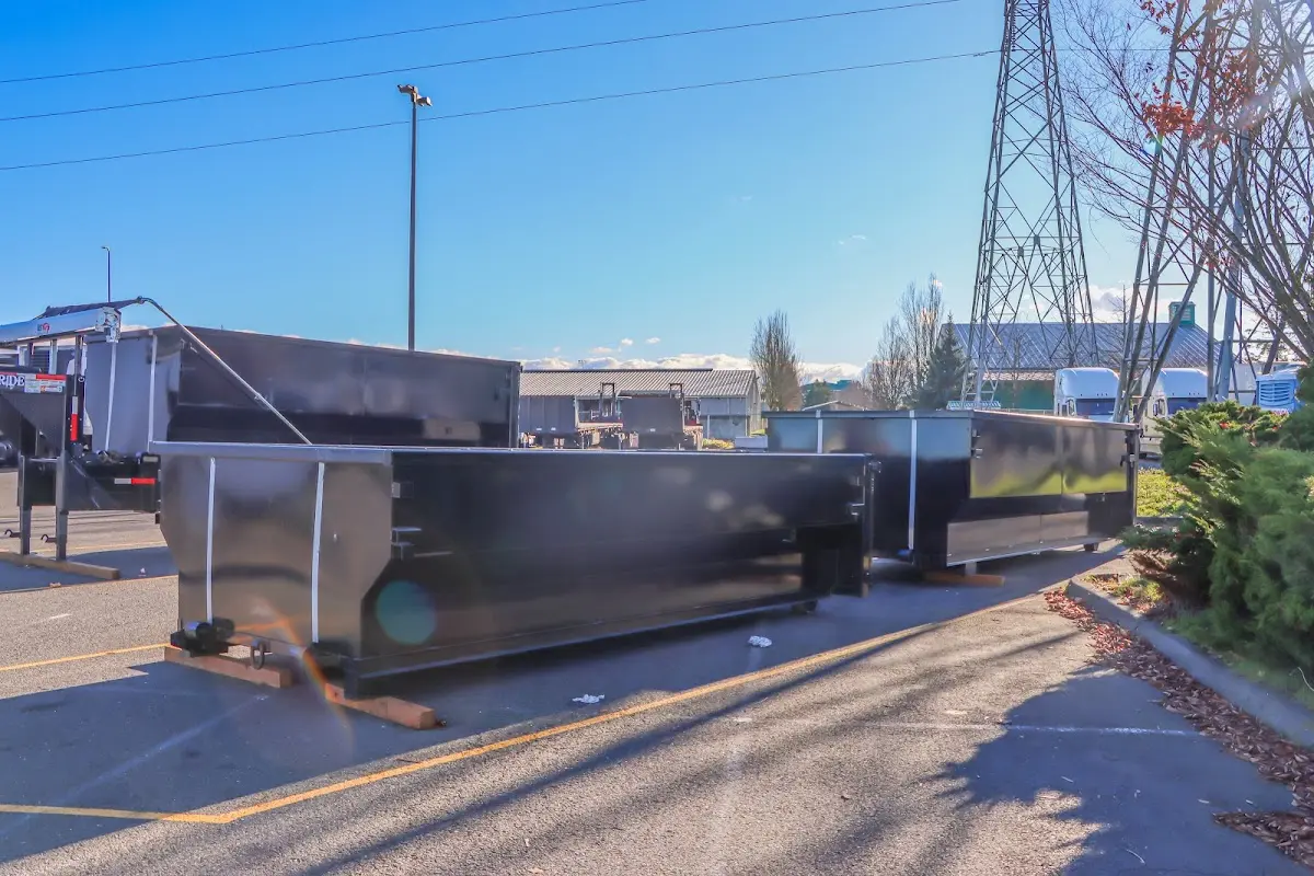 Roll-off dumpster ready for waste disposal at job site for Construction Dumpster Rental in East Wenatchee